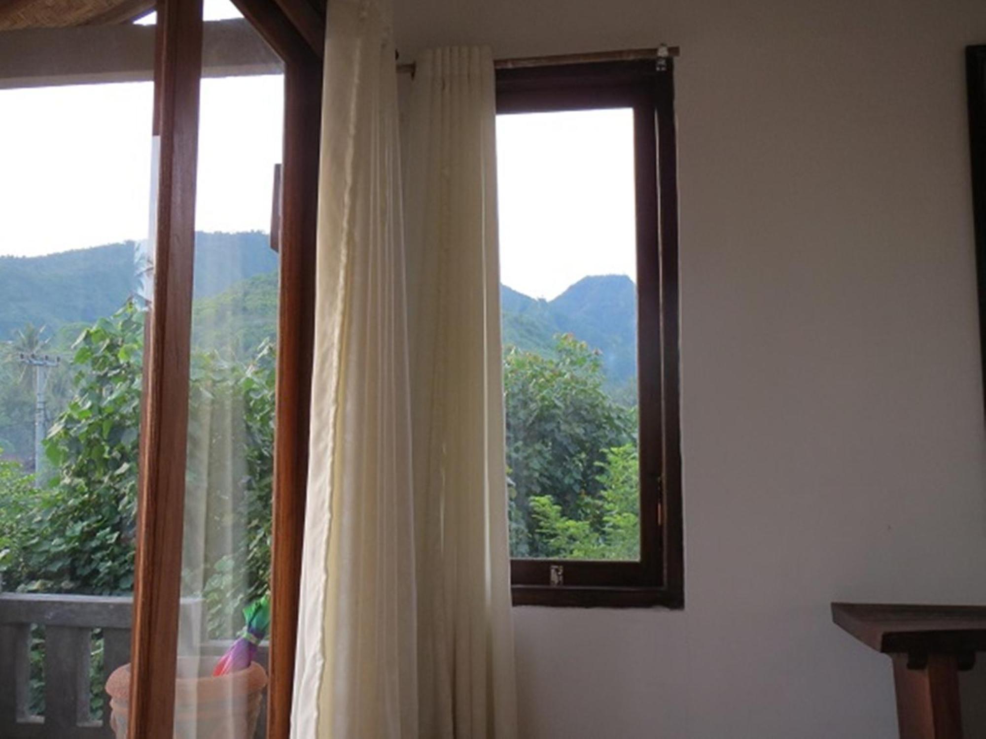 Bali Sari Homestay Amed Стая снимка
